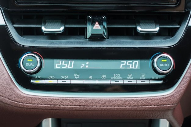 Close-up of the 2025 Honda CR-V Hybrid's dashboard, highlighting the updated infotainment system, ergonomic layout, and premium materials. The image focuses on the user interface, button placements, and overall design aesthetics.