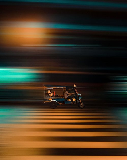 A screenshot from a high-speed racing game on the ASUS ROG Swift OLED PG42UQ, illustrating the monitor's smooth motion handling and lack of motion blur.