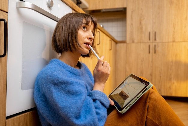 A person browsing a well-organized online store selling refurbished electronics on a tablet, showcasing a user-friendly interface with product listings and customer reviews.