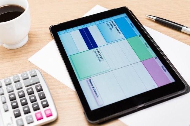 A user interface of YNAB (You Need A Budget) on a tablet, showcasing its budgeting categories, planning tools, and goal-setting features with a clean and organized design.