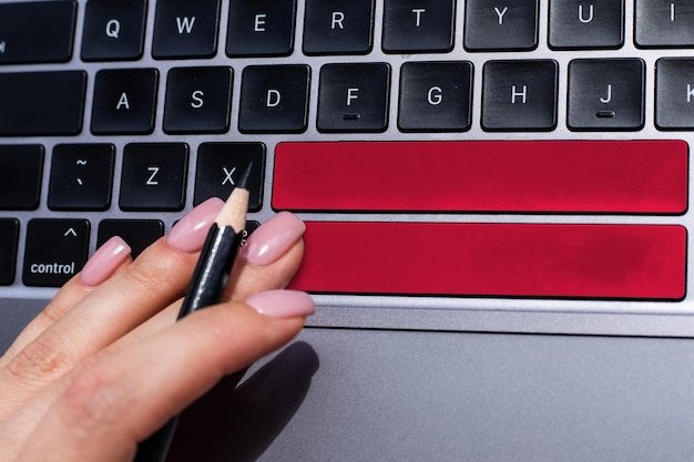 Close-up of a computer screen displaying a suspicious-looking review with generic language and an unverified user profile, highlighted with a red circle.