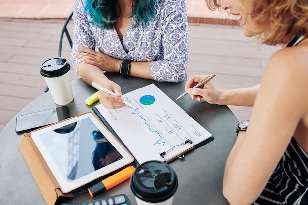 A graphical representation of data analytics being applied to purchasing decisions, showcasing charts, graphs, and consumer profiles.
