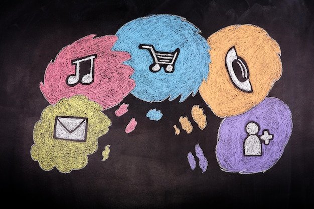 A graphic illustrating various cognitive biases and heuristics that influence consumer decisions, displayed as different icons connected by lines, showcasing how these subconscious shortcuts affect purchasing behavior.