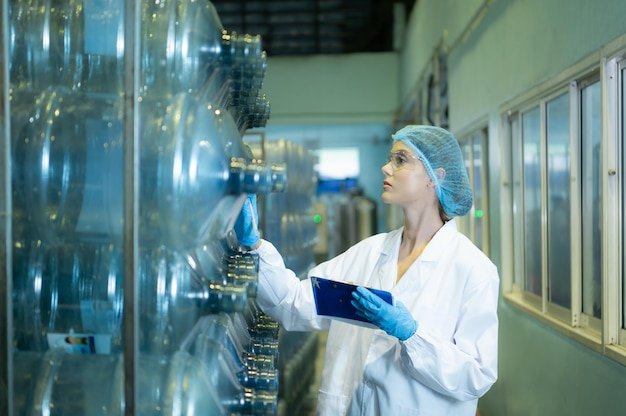 A laboratory technician in a clean environment processing DNA samples, with sophisticated equipment in the background, emphasizing the scientific rigor involved in DNA analysis.