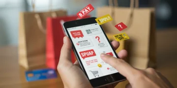 Smartphone displaying legitimate and suspicious online coupon offers